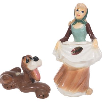 A Pair of Cinderella and Bruno Figurines by Evan K. Shaw.