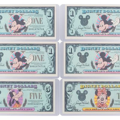 The Disneyland 1990 AA Series $1, $5, and $10 Bills.