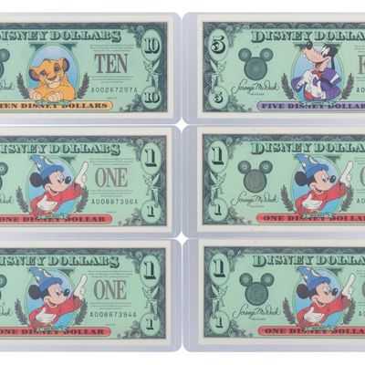 The Disneyland 1997 AA Series $1, $5, and $10 Bills.