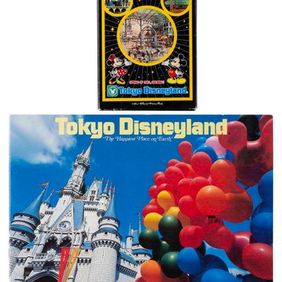 A Tokyo Disneyland Pre-Opening Booklet and Postcards Set.