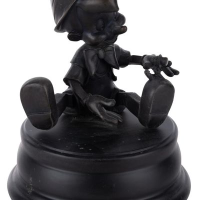 A Disneyland Hub Pinocchio Bronze Collectible.