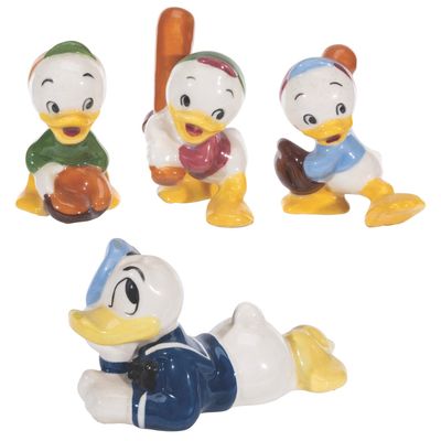 A Collection of Evan K. Shaw Donald Duck & Nephews Figurines.