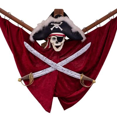 A Pirates of the Caribbean Jolly Roger Plaque Replica.
