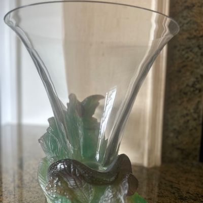 Daum France pate de verre crystal trumpet vase featuring a sculpted snake and green leaf base.