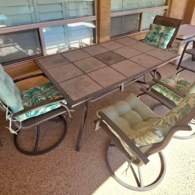 Outdoor Patio Dining Furniture Set - Rectangle Tiled Table, 4 Swivel Arm Chairs, Cushions