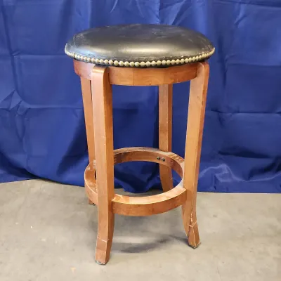 Swivel Bar Stool - Black Cushioned Seat, Wood Frame, Brass Nailhead Trim