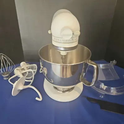White Kitchen Aid Artisan Mixer With Bowl And Multiple Attachments