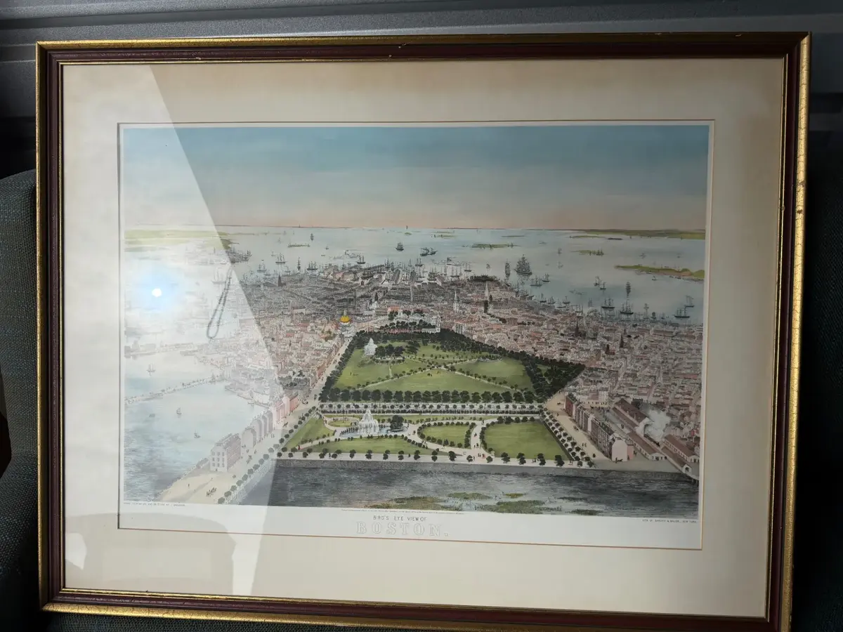 Framed print appears to be an 1850 Bird's Eye View of Boston originally drawn by artist J Bachmann