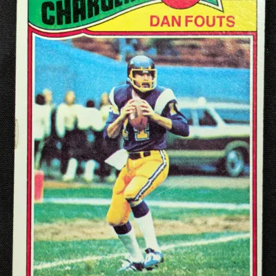 Vintage 1980 Topps Dan Fouts football card, number 360, featuring the San Diego Chargers quarterback in his classic uniform.