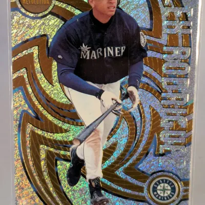 1998 Pacific Revolution Alex Rodriguez baseball card, featuring a die-cut design with a gold and silver holographic pattern, housed in a...