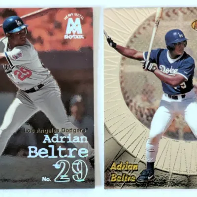 Two Adrian Beltre Los Angeles Dodgers baseball cards, including a SkyBox Heavy Metal card and a Bowman's Best card, both in good...