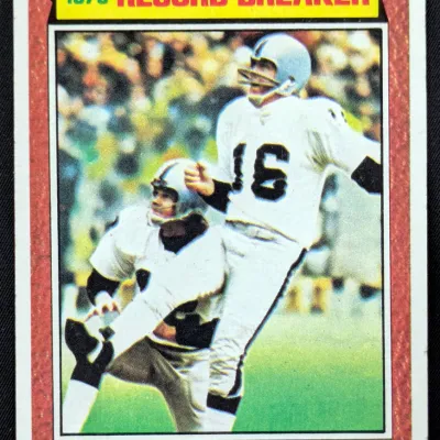 1975 Topps George Blanda "Record Breaker" football card, number 4, featuring the Oakland Raiders kicker and quarterback in action.