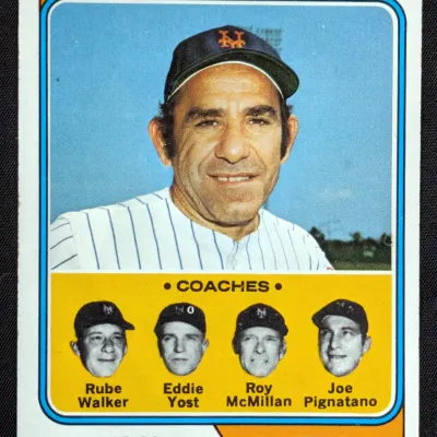Vintage 1973 Topps Yogi Berra New York Mets manager baseball card, featuring coaches Rube Walker, Eddie Yost, Roy McMillan, and Joe...