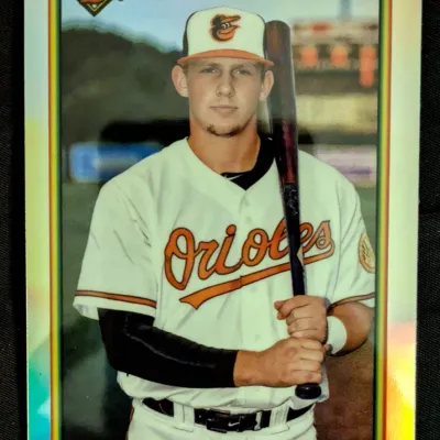 Bowman Heritage Adley Rutschman Baltimore Orioles baseball card featuring a refractor finish.