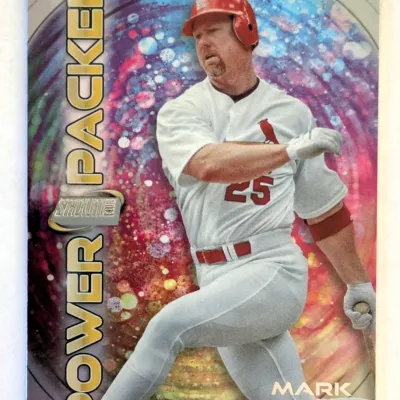 1999 Topps Stadium Club "Power Packed" Mark McGwire baseball card, featuring a colorful, holographic background design.