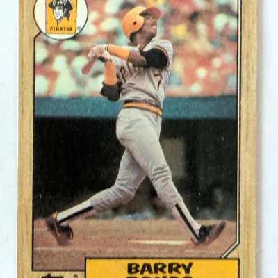 1987 Topps Barry Bonds rookie baseball card, number 320, featuring the iconic woodgrain border design and depicting him in his Pittsburgh...