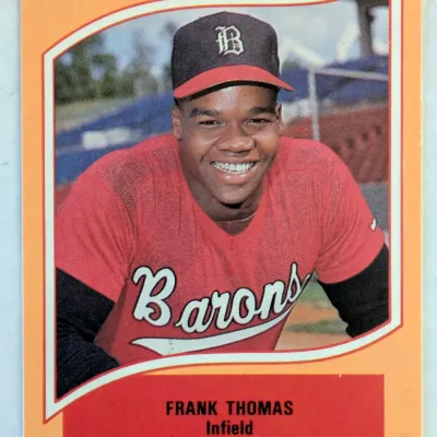 1990 ProCards minor league baseball card featuring Frank Thomas of the Birmingham Barons, showing light wear on the corners.