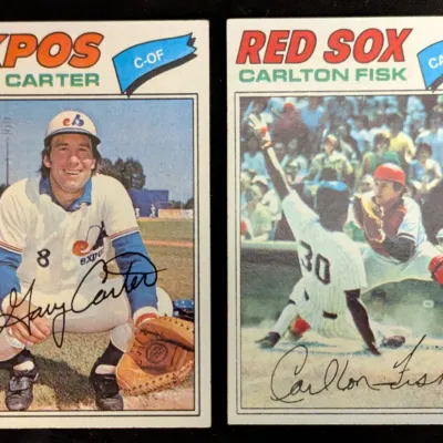 Two vintage Topps baseball cards from the late 1970s, featuring Montreal Expos catcher Gary Carter and Boston Red Sox catcher Carlton Fisk.