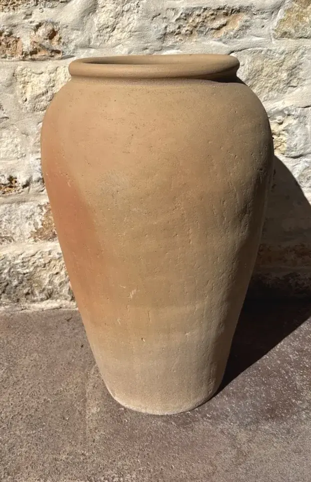 Tall terracotta outdoor pot 