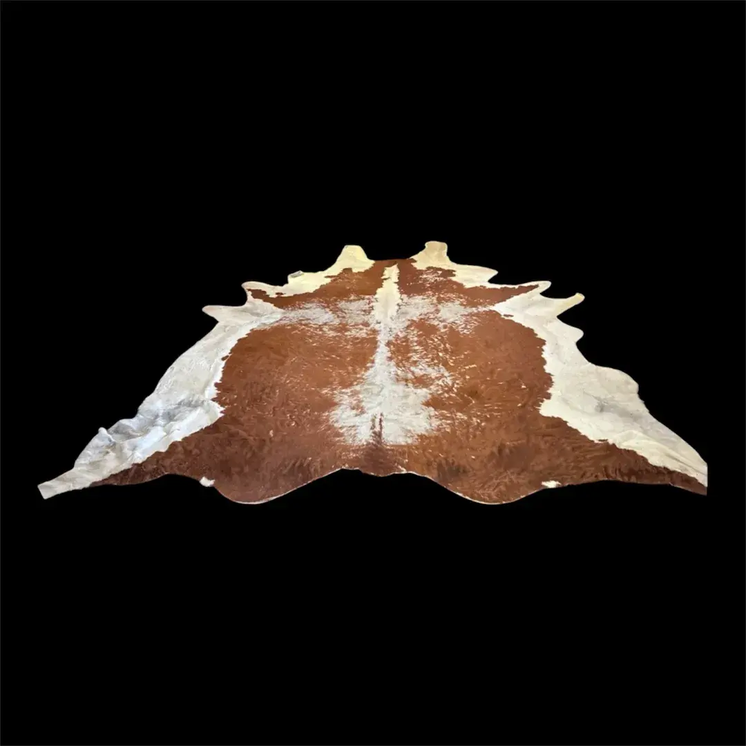 Genuine brown-and-white cowhide area rug