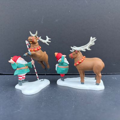 LOT 142: Village Accessories by Dept 56: Planning a Winter Vacation, Marshmallows Around the Campfire, Open Wide, Twinkling Lit Shrubs...
