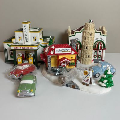 LOT 82: Dept 56 Snow Village Collection: Holly Brothers Garage, Pisa Pizza & Village Used Car Lot