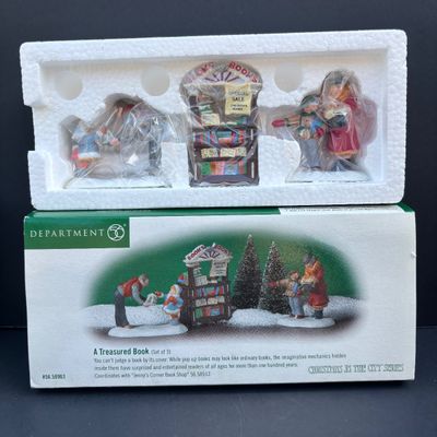 LOT 143: Village Accessories by Dept 56: Delivering Real Plastic Snow, Santa in the City, Elves on Track, Photo w/Santa, Tangles in...