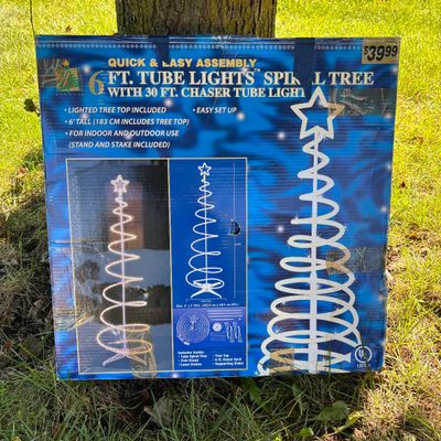 LOT 63: Christmas Holiday Outdoor Inflatable Decoration, 6ft Tube Light Spiral Tree & Rope Lightening Decoration
