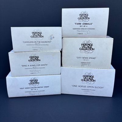 LOT 76: Dept 56 Accessories w/Original Boxes: Sing a Song for Santa, Carolers on the Doorstep, Violet Vendor- Chestnut Vendor-Carolers,...