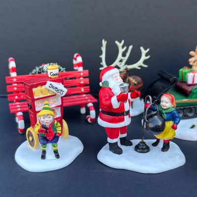 LOT 138: Department 56 Heritage Village Collection Christmas Figurines Lot with Boxes