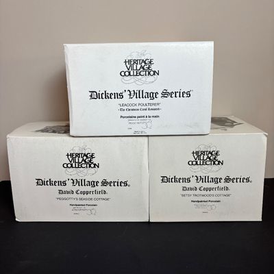 LOT 87: Dept 56 Dickens Village Houses w/Original Boxes: Leacock Poultry, Peggotty's Seaside Cottage, Betsy Trotwood's Cottage