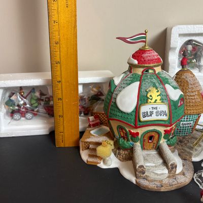 LOT 93: Dept 56 North Pole Series The Elf Spa & Heritage Collection Accessories: I'll Need More Toys, Baker Elves, Toy Maker...