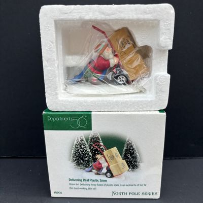 LOT 143: Village Accessories by Dept 56: Delivering Real Plastic Snow, Santa in the City, Elves on Track, Photo w/Santa, Tangles in...