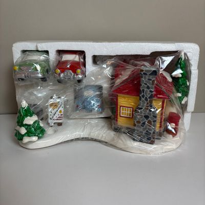 LOT 82: Dept 56 Snow Village Collection: Holly Brothers Garage, Pisa Pizza & Village Used Car Lot