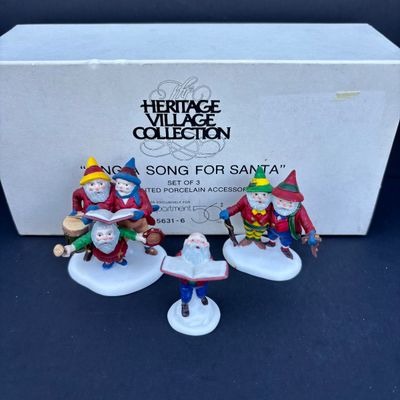 LOT 76: Dept 56 Accessories w/Original Boxes: Sing a Song for Santa, Carolers on the Doorstep, Violet Vendor- Chestnut Vendor-Carolers,...