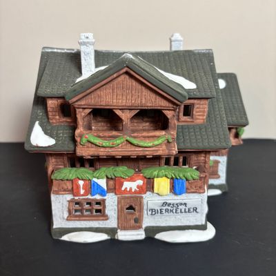 LOT 96: Dept 56 Alpine Village Series E. Staubr & Besson Bierkeller along with Porcelain Pine Tree