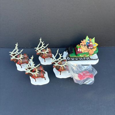 LOT 138: Department 56 Heritage Village Collection Christmas Figurines Lot with Boxes
