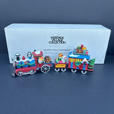 LOT 80: Dept 56 Accessories w/Original Boxes: Snow Cone Elves, Santa's Little Helpers, North Pole Express, Wrought Iron Fence, Candy...