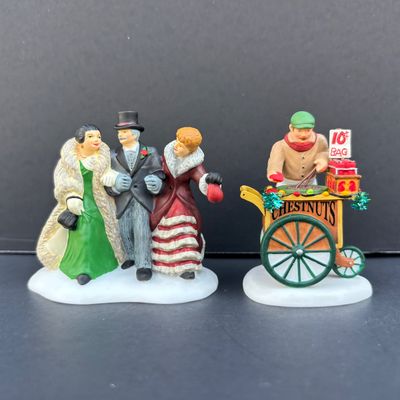 LOT 140: Dept 56 Village Accessories: Animated Holiday Joy, Hot Roasted Chestnuts, Until We Meet Again & On To the Show