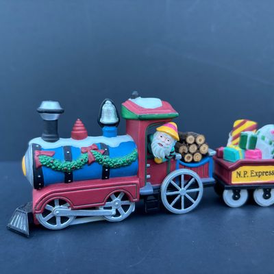 LOT 80: Dept 56 Accessories w/Original Boxes: Snow Cone Elves, Santa's Little Helpers, North Pole Express, Wrought Iron Fence, Candy...