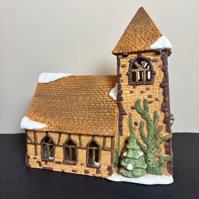 LOT 83: Dept 56 Heritage Village Collection Dickens Village Series: Village Church & Bishop Oast House & Village Porcelain Pine Tree