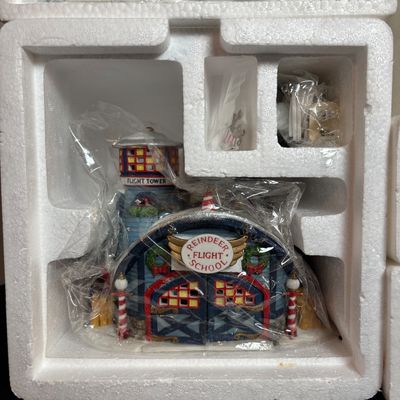 LOT 91: Dept 56 Dickens Village Accessories & North Pole Series Reindeer Flight School w/Original Boxes