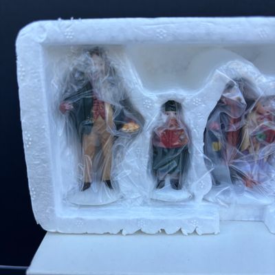 LOT 76: Dept 56 Accessories w/Original Boxes: Sing a Song for Santa, Carolers on the Doorstep, Violet Vendor- Chestnut Vendor-Carolers,...
