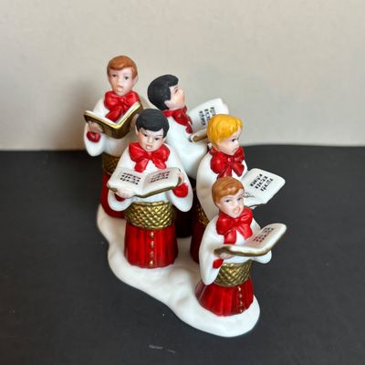 LOT 86: Dept 56 Heritage Village Collection: Choirboys All in a Row, Carolers on the Doorstep & Dickens Series Village Church &...