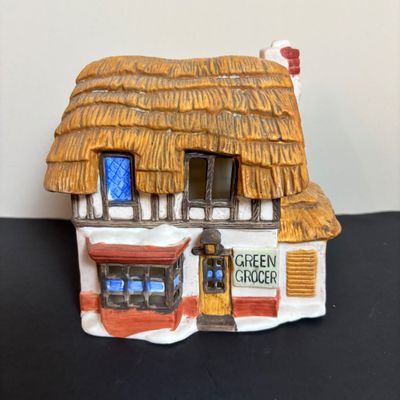 LOT 86: Dept 56 Heritage Village Collection: Choirboys All in a Row, Carolers on the Doorstep & Dickens Series Village Church &...