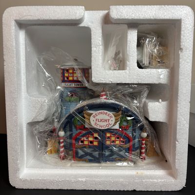 LOT 91: Dept 56 Dickens Village Accessories & North Pole Series Reindeer Flight School w/Original Boxes