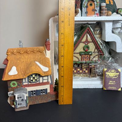 LOT 87: Dept 56 Dickens Village Houses w/Original Boxes: Leacock Poultry, Peggotty's Seaside Cottage, Betsy Trotwood's Cottage