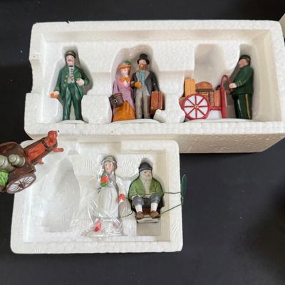 LOT 38: Dept 56 Holiday Village Accessories - Alpine Villagers(2 Sets), Vision of Christmas Past, Christmas Carol Morning, Chelsea Market...