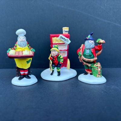 LOT 81: Dept 56 Accessories w/Original Boxes: Trimming the North Pole, Transport, Charting Santa's Course, Baker's Elves, One...