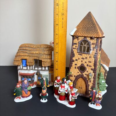 LOT 86: Dept 56 Heritage Village Collection: Choirboys All in a Row, Carolers on the Doorstep & Dickens Series Village Church &...